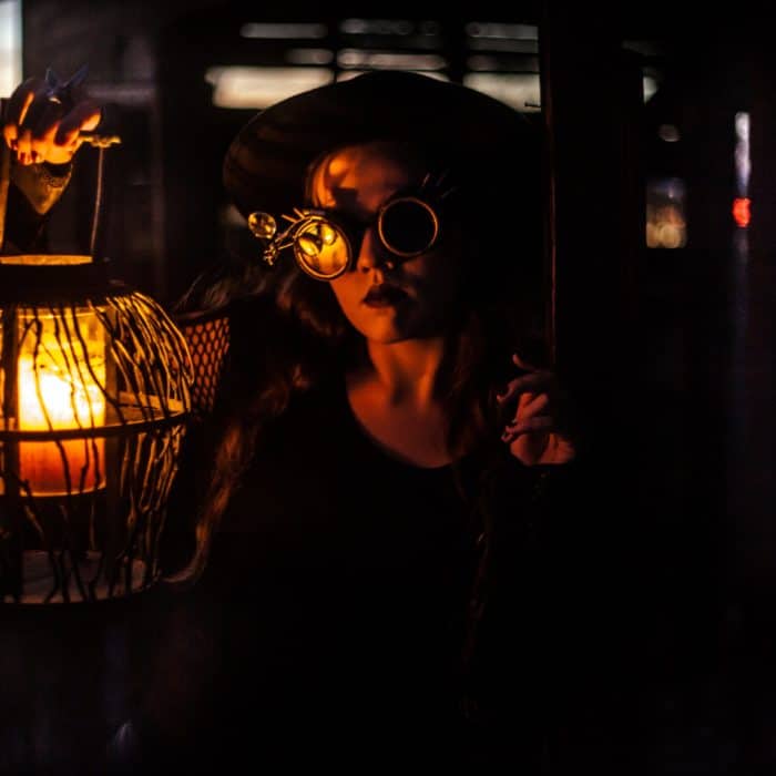 woman holding a lamp
