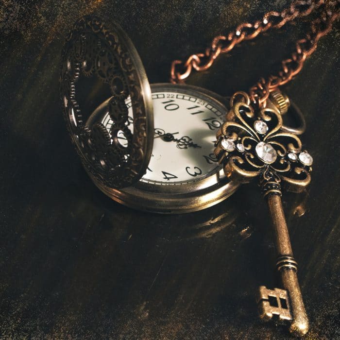 steampunk pocket watch and key