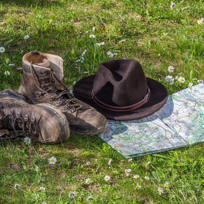 boots, hat, map, compass