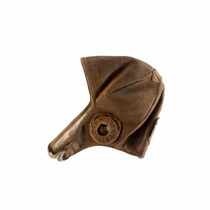 Pilot's hat. Brown leather earflap. Unform headdress isolated on white background. Pilot clothes