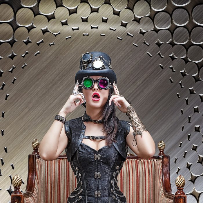 steampunk woman with hat and goggles