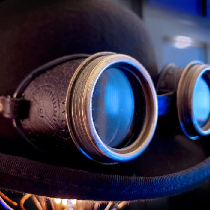 Steampunk goggles on a hat facing sideways