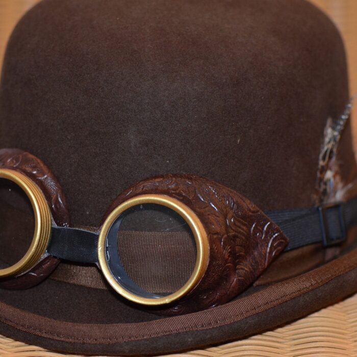 Steampunk goggles on a hat facing front