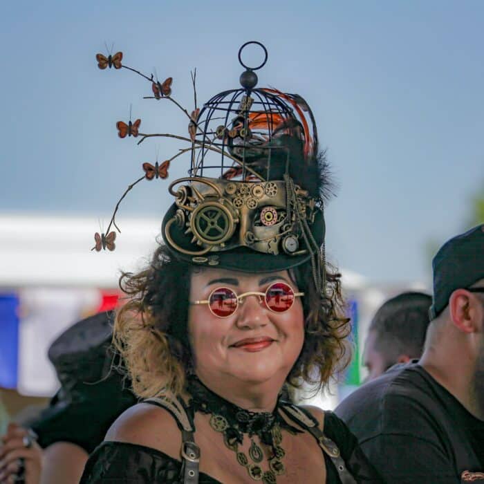 Steampunk lady cosplayer wearing sunglasses